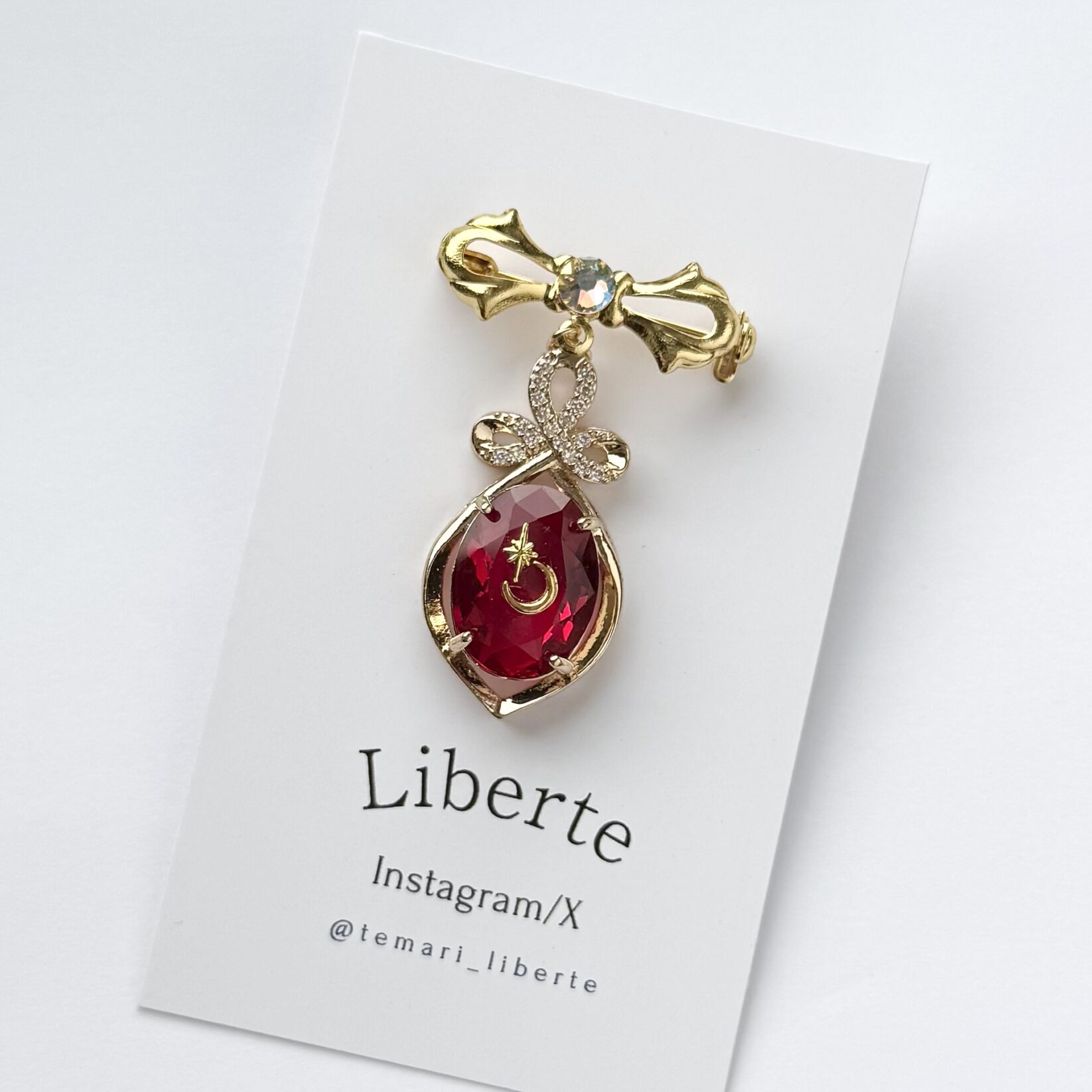 New宝星石ブローチ/Flame