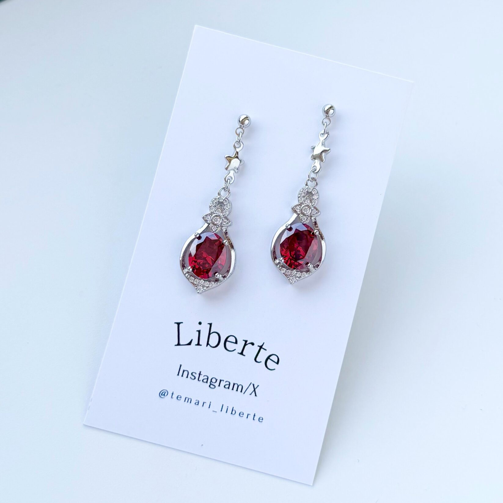 mini宝星石の耳飾り/Flame